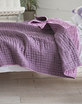 Chenevard Reversible Quilt Damson & Magenta by Designers Guild Bedding